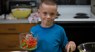 Child cooking.